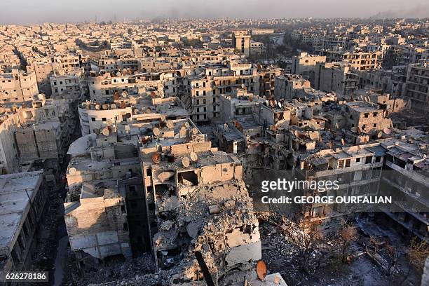 General view of Aleppo taken from the top of a building in the city's Bustan al-Basha neighbourhood on November 28 during Syrian government forces...
