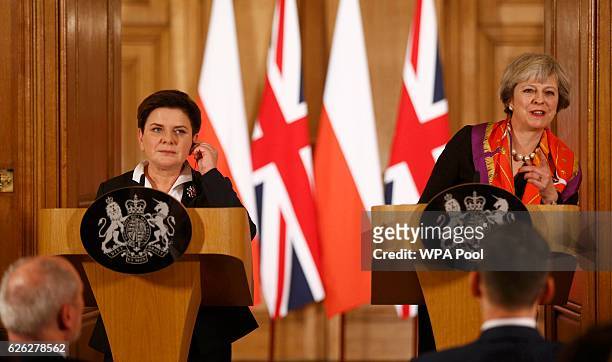 British Prime Minister Theresa May and Polish Prime Minister Beata Szydlo hold a joint press conference at 10 Downing Street on November 28, 2016 in...