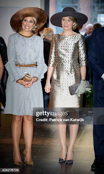Queen Maxima of the Netherlands and Queen Mathilde of Belgium during their visit to the Flemish culture house Bakke Grond on November 28 2016 in...