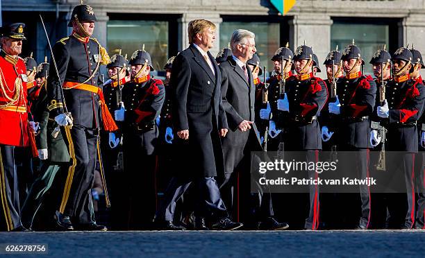 King Willem-Alexander of the Netherlands welcomes King Philippe of Belgium during an official welcome ceremony at the Dam Square in the front of the...