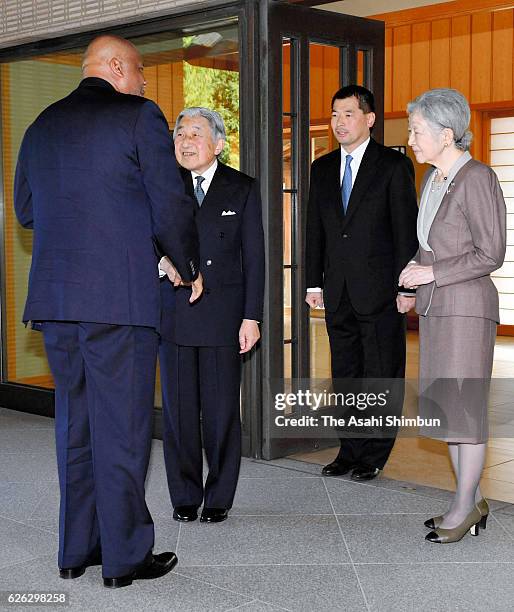 Letsie III of Lesotho is greeted by Emperor Akihito and Empress Michiko prior to their meeting at the Imperial Palace on November 25, 2016 in Tokyo,...