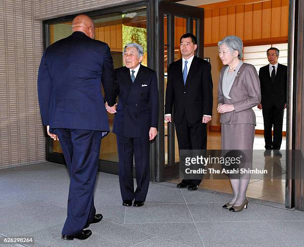 Letsie III of Lesotho is greeted by Emperor Akihito and Empress Michiko prior to their meeting at the Imperial Palace on November 25, 2016 in Tokyo,...