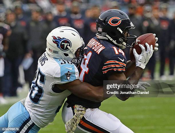 Deonte Thompson of the Chicago Bears makes a catch in front of LeShaun Sims of the Tennessee Titans at Soldier Field on November 27, 2016 in Chicago,...