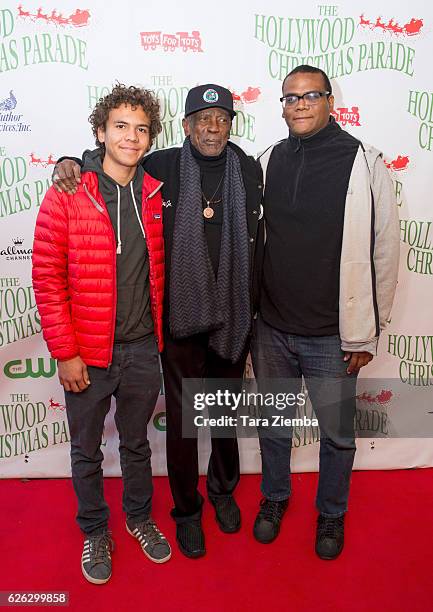 Malcolm Gossett, Actor Louis Gossett Jr. And son director/writer Satie Gossett attend the 85th Annual Hollywood Christmas Parade on November 27, 2016...