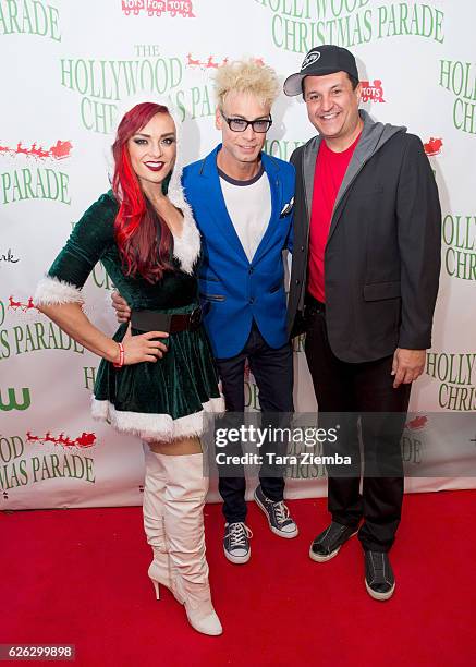 April Leopardi, MurraySawChuck, and Doug 'Lefty' Leferovitch arrive at the 85th Annual Hollywood Christmas Parade on November 27, 2016 in Hollywood,...