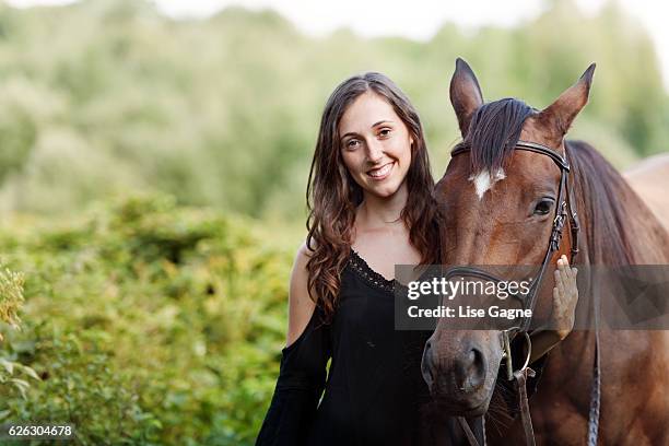 woman with her horse - lise gagne stock pictures, royalty-free photos & images