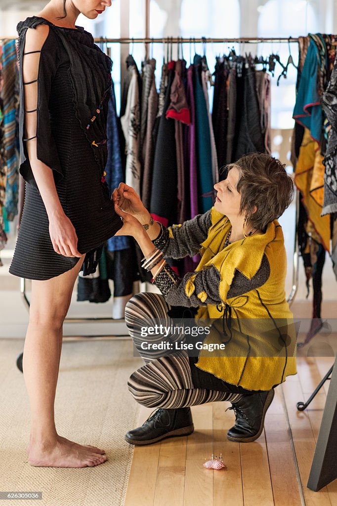 Fashion Designer making adjustment