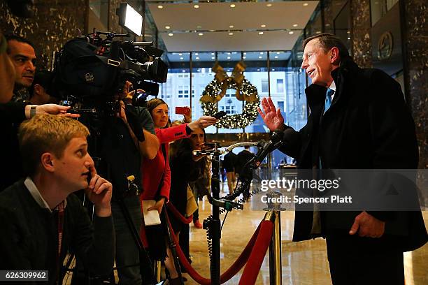 Retired General David Petraeus speaks to members of the media while leaving Trump Tower on November 28, 2016 in New York City. President-elect Donald...