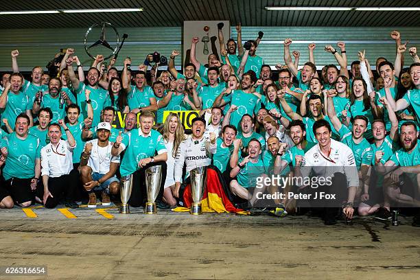 Nico Rosberg of Germany and Mercedes celebrates with his team after becoming the 2016 F1 World Drivers Champion during the Abu Dhabi Formula One...
