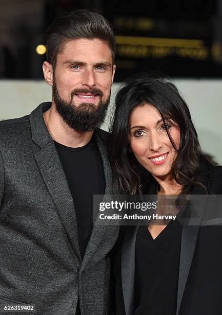 Olivier Giroud and wife Jennifer Giroud attend the World Premiere of "I Am Bolt" at Odeon Leicester Square on November 28, 2016 in London, England.