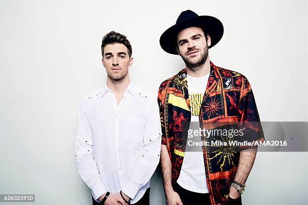 Recording artists Alex Pall and Andrew Taggart, winners of the award for Favorite EDM Group pose in the press room during the 2016 American Music...