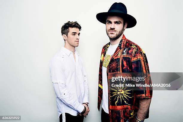 Recording artists Alex Pall and Andrew Taggart, winners of the award for Favorite EDM Group pose in the press room during the 2016 American Music...