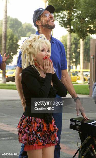 Episode 2574 -- Pictured: Musician Dolly Parton and Sears employee during the "Appliance Hurling" segment on October 9, 2003 --