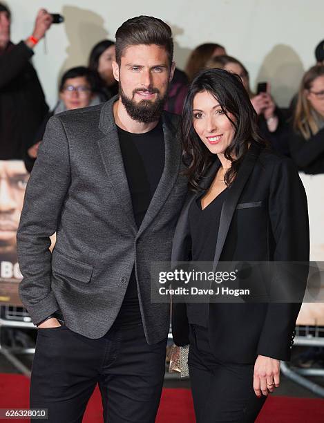 Olivier Giroud and Jennifer Giroud attend the World Premiere of "I Am Bolt" at Odeon Leicester Square on November 28, 2016 in London, England.