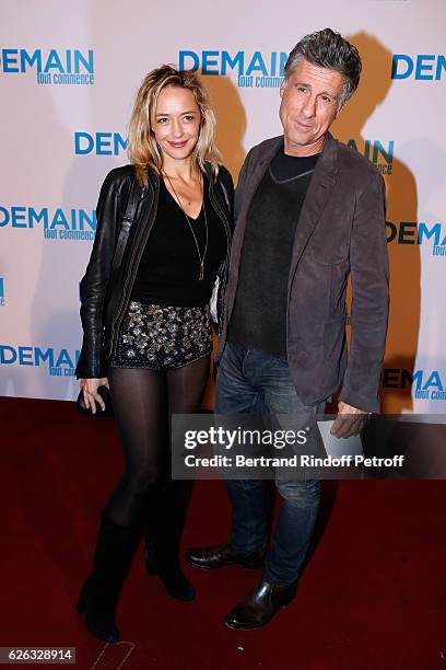 Actress Helene de Fougerolles and her companion, fondator of Meetic, Marc Simoncini attend the "Demain Tout Commence" Paris Premiere at Cinema Le...