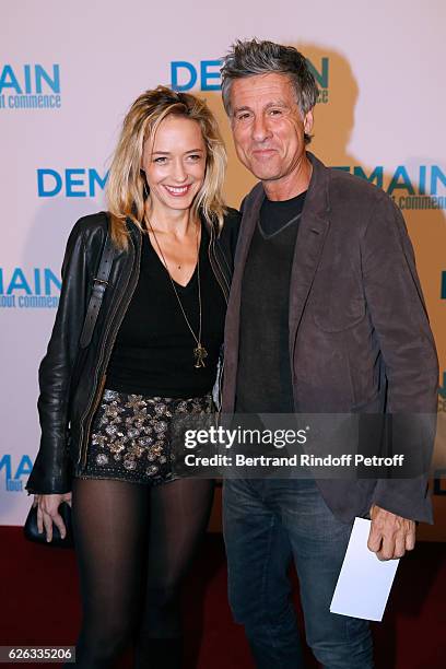 Actress Helene de Fougerolles and her companion, fondator of Meetic, Marc Simoncini attend the "Demain Tout Commence" Paris Premiere at Cinema Le...