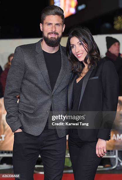 Olivier Giroud and Jennifer Giroud attend the World Premiere of "I Am Bolt" at Odeon Leicester Square on November 28, 2016 in London, England.