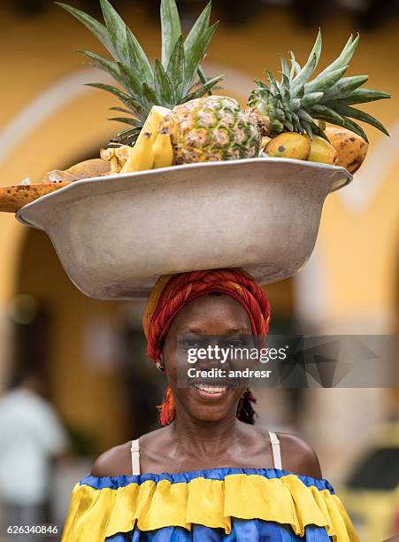 woman selling fruits in cartagena - cartagena colombia stock pictures, royalty-free photos & images