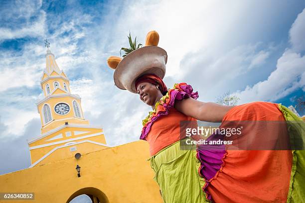 palenquera selling fruits in cartagena - colombia stock pictures, royalty-free photos & images