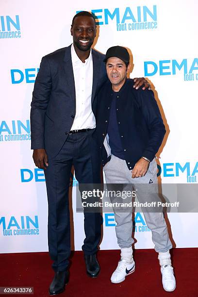 Actor of the movie Omar Sy and humorist Jamel Debbouze attend the "Demain Tout Commence" Paris Premiere at Cinema Le Grand Rex on November 28, 2016...