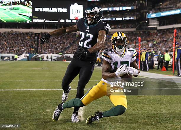 Davante Adams of the Green Bay Packers catches a touchdown pass against Nolan Carroll of the Philadelphia Eagles in the second quarter at Lincoln...