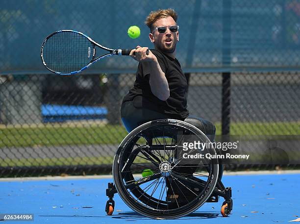 Newcombe medal winner Dylan Alcott has a hit of tennis during a media opportunity at Melbourne Park on November 29, 2016 in Melbourne, Australia.