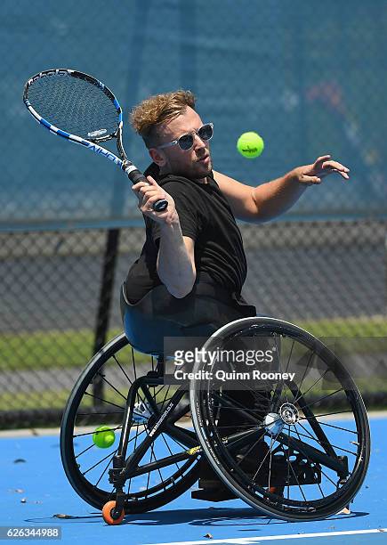 Newcombe medal winner Dylan Alcott has a hit of tennis during a media opportunity at Melbourne Park on November 29, 2016 in Melbourne, Australia.