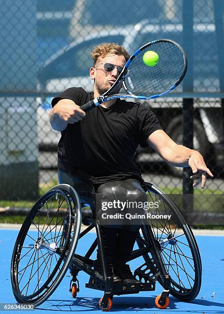 Newcombe medal winner Dylan Alcott has a hit of tennis during a media opportunity at Melbourne Park on November 29, 2016 in Melbourne, Australia.