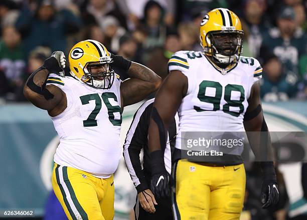 Mike Daniels and Letroy Guion of the Green Bay Packers react against the Philadelphia Eagles in the second quarter at Lincoln Financial Field on...