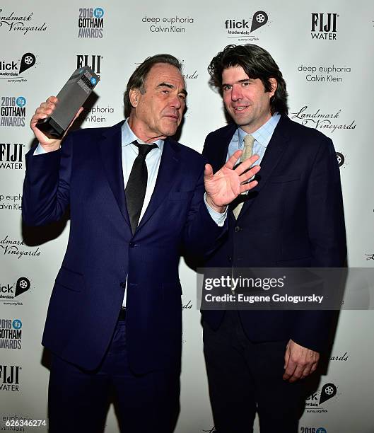 Director and Honoree Oliver Stone and Director JC Chandor pose backstage at the 2016 IFP Gotham Independent Film Awards Co-Sponsored By FIJI Water at...