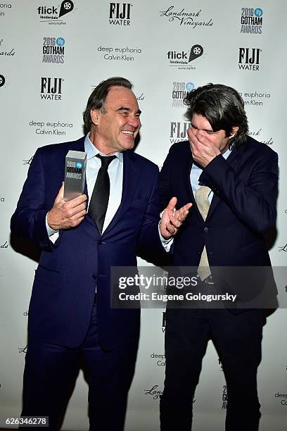 Director and Honoree Oliver Stone and Director JC Chandor pose backstage at the 2016 IFP Gotham Independent Film Awards Co-Sponsored By FIJI Water at...