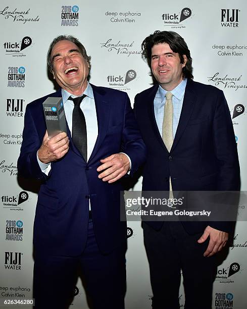 Director and Honoree Oliver Stone and Director JC Chandor pose backstage at the 2016 IFP Gotham Independent Film Awards Co-Sponsored By FIJI Water at...