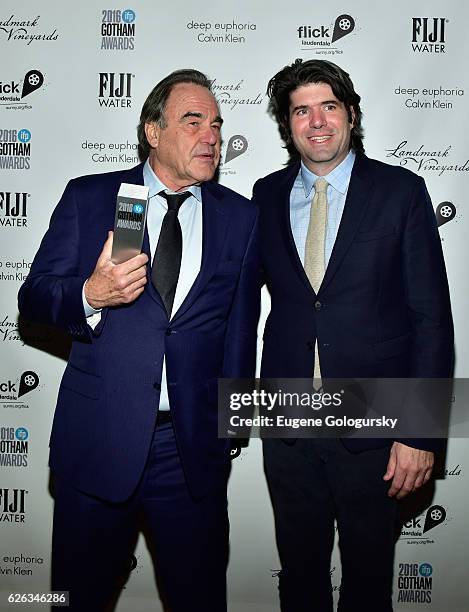 Director and Honoree Oliver Stone and Director JC Chandor pose backstage at the 2016 IFP Gotham Independent Film Awards Co-Sponsored By FIJI Water at...