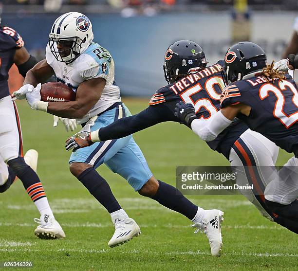 Rashad Johnson of the Tennessee Titans is pursued by Danny Trevathan and Cre'von LeBlanc of the Chicago Bears at Soldier Field on November 27, 2016...