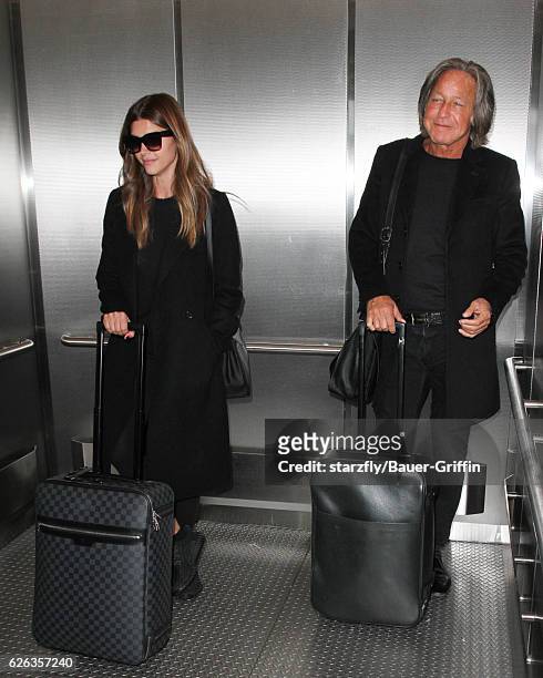 Mohamed Hadid and Shiva Safai are seen at LAX on November 28, 2016 in Los Angeles, California.