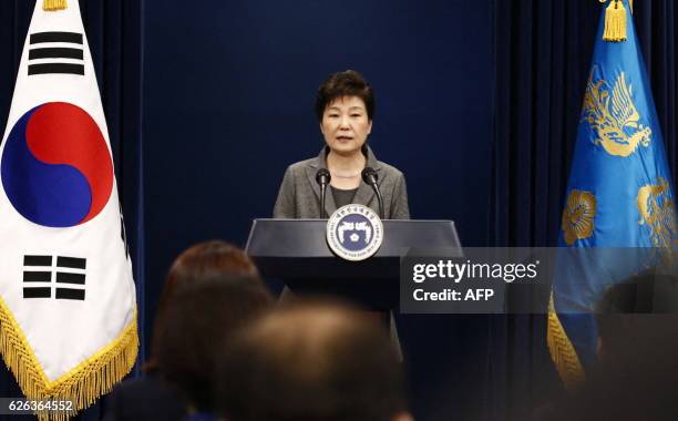 South Korean President Park Geun-Hye speaks during an address to the nation, at the presidential Blue House in Seoul on November 29, 2016. South...