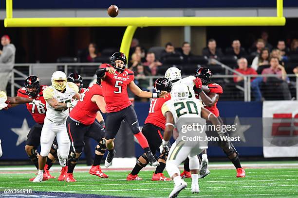 Patrick Mahomes II of the Texas Tech Red Raiders passes the ball during the game against the Baylor Bears on November 25, 2016 at AT&T Stadium in...