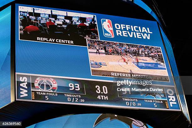 View of the scoreboard during a replay with three seconds left in the game between the Washington Wizards and the Orlando Magic at Amway Center on...