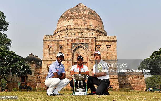 Chikkarangaappa of India, Chiragh Kumar of India, defending champion and Liang Wenchong of China pictured at Lodi gardens with the winner's trophy...