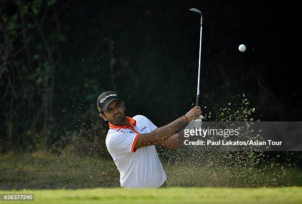 Chiragh Kumar of India, defending champion, plays a shot during practice for the Panasonic Open India at Delhi Golf Club on November 29, 2016 in New...