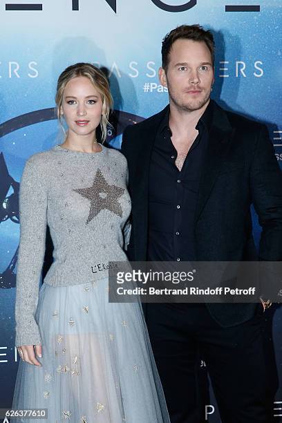 Actress Jennifer Lawrence, dressed in Dior, and actor Chris Pratt attend the "Passengers" Paris Photocall at Hotel George V on November 29, 2016 in...