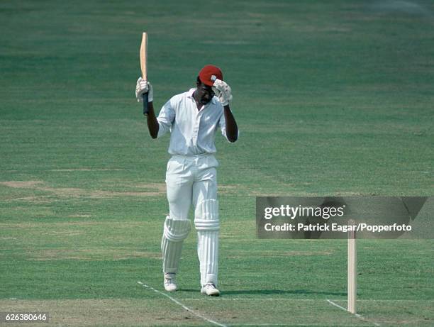 West Indies captain Clive Lloyd celebrates reaching 100 runs during the Prudential World Cup Final between Australia and West Indies at Lord's...