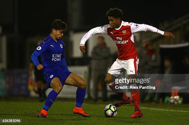 Gedion Zelalem of Arsenal takes on Dylan Watts of Leicester City during the Premier League 2 match between Arsenal and Leicester City at Meadow Park...