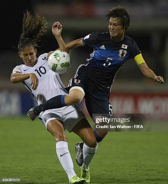 Clara Mateo of France is tackled by Ruka Norimatsu of Japan during the FIFA U-20 Women's World Cup, Semi Final match between Japan and France at Sir...