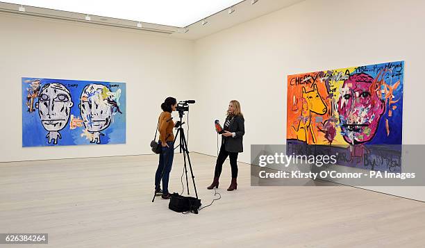 Senior Director Philippa Adams is interviewed in front of work by Bjarne Melgaard titled Untitled and Untitled at a photo call and press view for the...