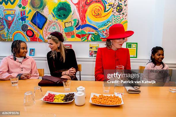 Queen Mathilde and Queen Maxima visit Vitalis on November 29, 2016 in The Hague, Netherlands. Vitalis is supported by the Oranje Foundation and guide...