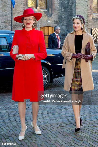 King Willem-Alexander, Queen Maxima and Queen Mathilde arrive at the Binnenhof to attend the government lunch in the Ridderzaal on November 29, 2016...