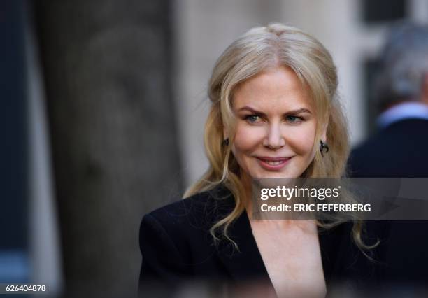 Australian actress Nicole Kidman arrives for the presentation of the 2017 Pirelli calendar in Paris on November 29, 2016.