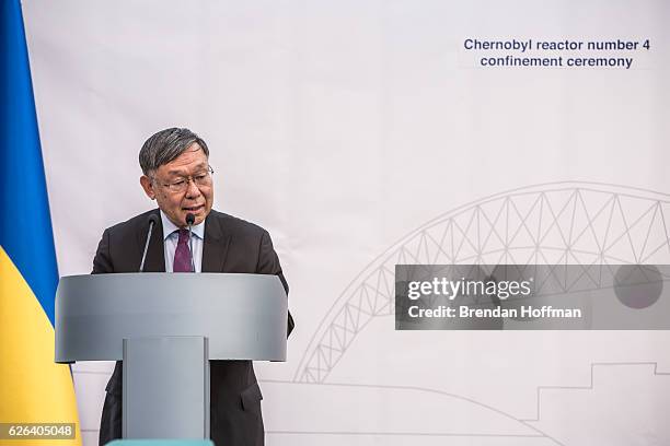 Shigeki Sumi, Japan's ambassador to Ukraine, speaks at a ceremony to mark the positioning of the New Safe Confinement sarcophagus over the destroyed...