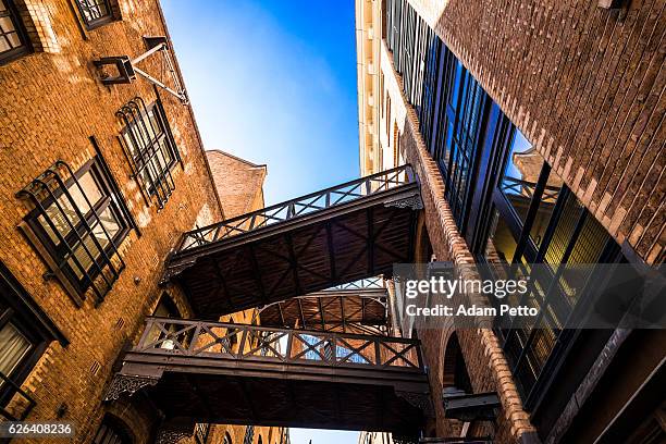 residential flats and apartments by river thames, london, uk - bermondsey stock pictures, royalty-free photos & images